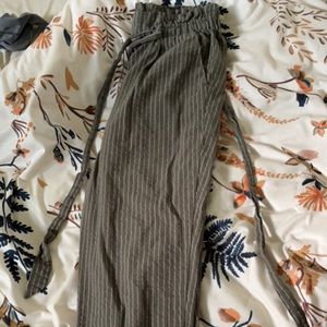 Green paper bag capris